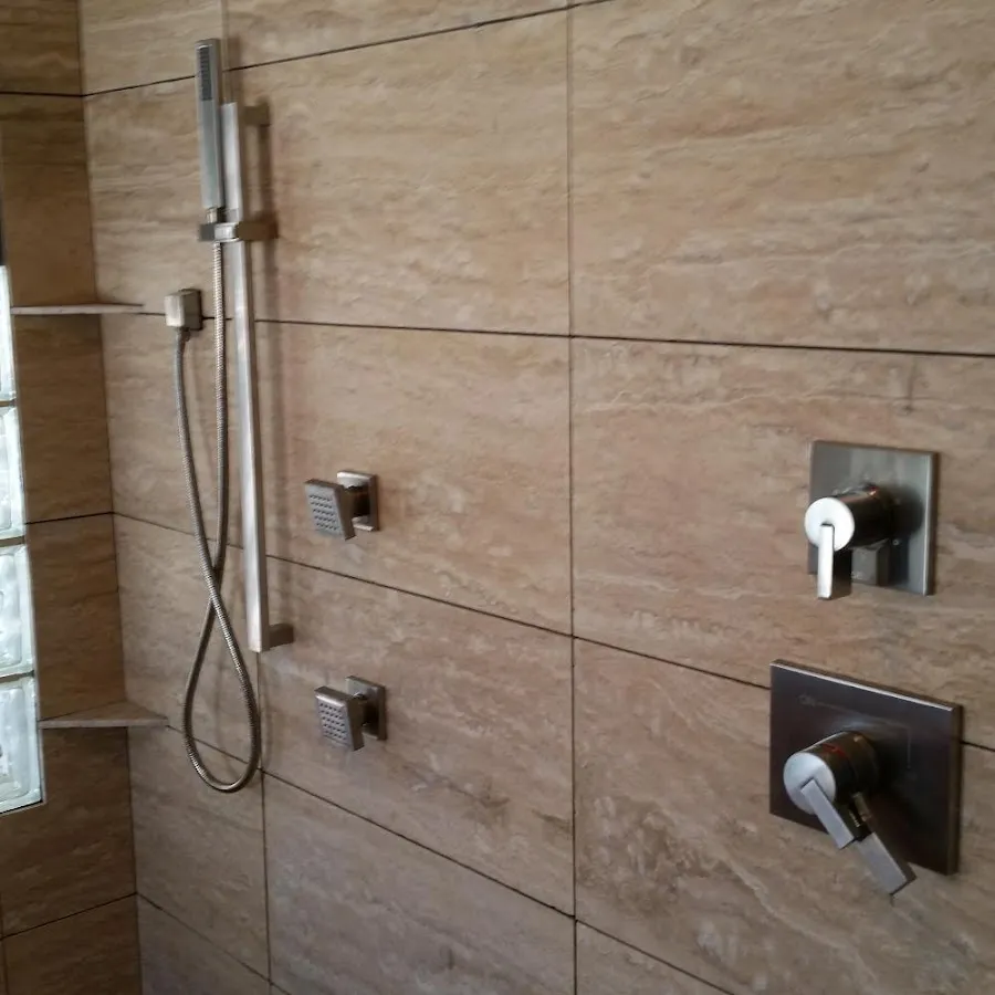 Shower fixture installation for Water Heater Replacement in Marquette